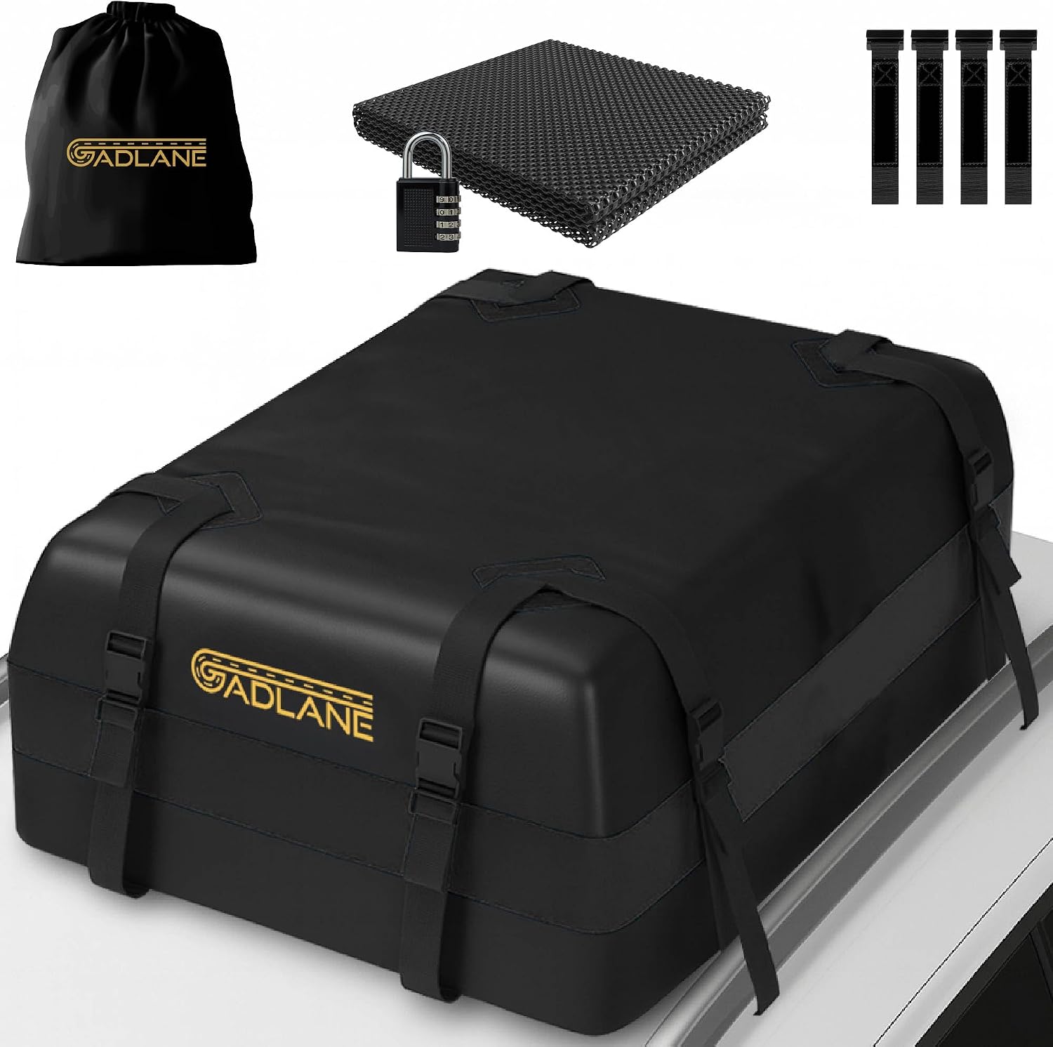 Waterproof car roof bag strapped to the roof of a car, packed for a road trip